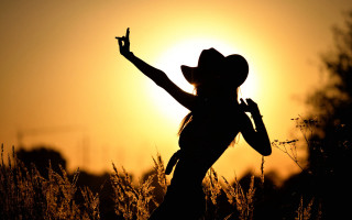 Woman cowboy hat sunset backlighting - a woman in a cowboy hat free wallpaper