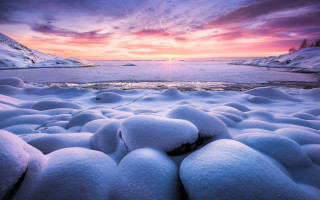 Sunset frozen lake snow rocks - lake free wallpaper