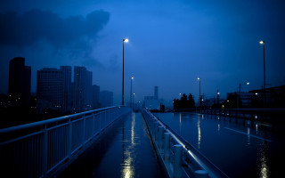 Cityscape night lights water buildings - a walkway free wallpaper