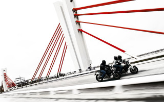 Motorcycles bridge water red poles - a bridge over water free wallpaper