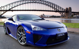 Blue sports car bridge background - a bridge and a bridge in the background free wallpaper