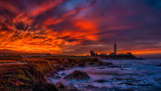 Lighthouse rocky shore mystical sky 2 - a rocky shore free wallpaper for desktop