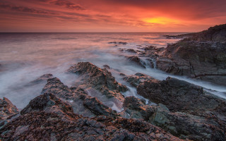 Rocky beach red sunset matte - a rocky beach free wallpaper