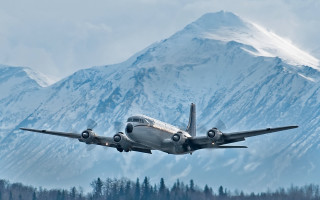 Airplane mountain snow precisionism tiltshift - over a mountain range free wallpaper