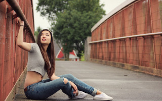 Woman brick wall sitting outdoors - the ground next free wallpaper
