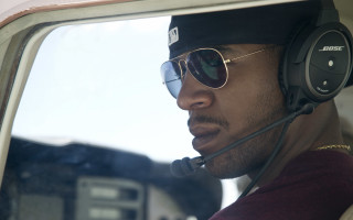 Afrofuturism pilot man sunglasses headset - free bird wallpaper