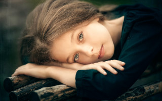 Young girl leaning on rail - brigette barrager free wallpaper