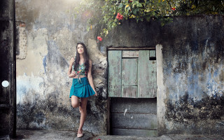 Woman door run down plant - growing free wallpaper