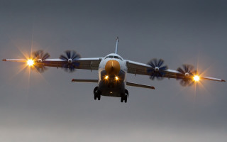 Airplane lights sky clouds backlit - a plane free wallpaper