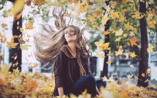 Woman leaves autumn flowing hair - flowing free wallpaper