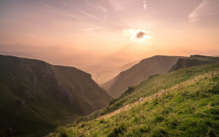 Grassy hill sheep mountains valley - a view of a valley free wallpaper