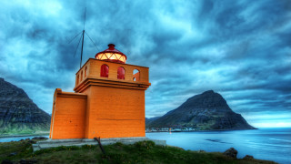 Lighthouse hill water mountains clouds - a body of water and mountains free wallpaper