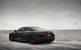 Black sports car ocean kite - a black sports car free wallpaper for desktop