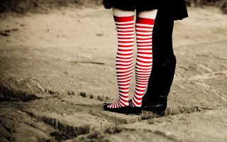 Woman striped socks beach legs - free retro wallpaper