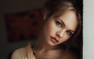 Eszter mattioni blue eyes portrait - against a wall free wallpaper