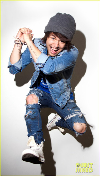 Man denim jacket jumping arms - photoshoot free wallpaper