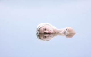 White hair woman floating water - a hyperrealistic painting free wallpaper