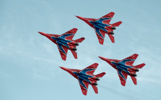 Three red blue jets flying - formation in the sky free wallpaper