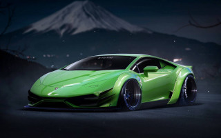 Green sports car mountain full - mountain in the distance free wallpaper