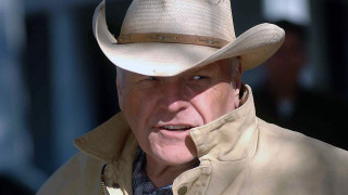 Cowboy man serious blue eyes - his face free wallpaper for desktop