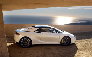 White sports car ocean view - path free wallpaper