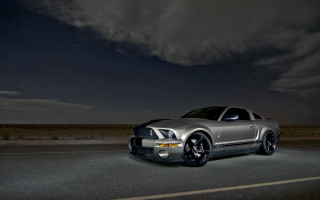 Silver mustang night road dark - a dark sky in the background free wallpaper