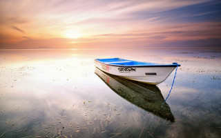 Small boat lake sunset cloudy - top of a lake under a cloudy sky free wallpaper for desktop