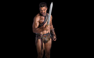 Man sword costume beard muscular - a black backdrop free wallpaper