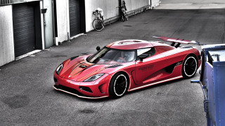 Red sports car parking lot 46 - a bicycle free wallpaper