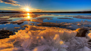 Sunset frozen lake ice chunks - a sunset over a free wallpaper