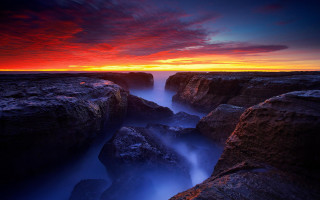 Sunset rocky beach water red 2 - amazing depth free wallpaper