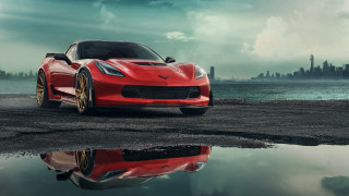 Red sports car beach cityscape - a beach next free wallpaper for desktop