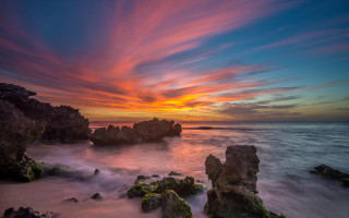 Sunset ocean rocks water clouds - rock and water free wallpaper