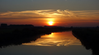 Sunset river clouds contrails flemish - stroke free wallpaper