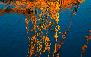Boat reflection lake abstract fire - the water of a lake free wallpaper
