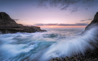 Wave cliffs sunset pink sky - the ocean shore free wallpaper