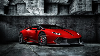 Red sports car dark room 34 - a concrete wall behind free wallpaper