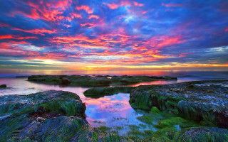 Colorful sunset rocky beach water - a few rock free wallpaper