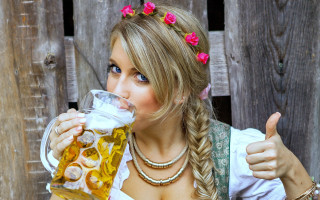 Woman drinking beer thumb up - front of her face free wallpaper