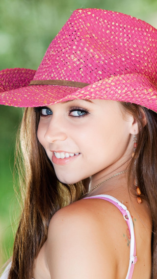 Girl pink hat smiling green - a pink hat free wallpaper for mobile