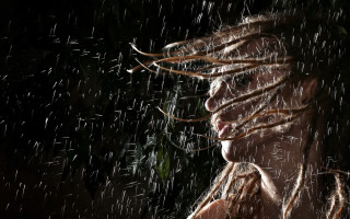 Woman dreadlocks rain wind cityscape - dreadlock free wallpaper