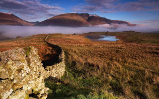 Mountain range lake fog clouds - a lake in the foreground free wallpaper