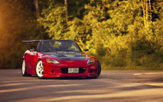 Red sports car autumn leaves 6 - the side of the road in front free wallpaper