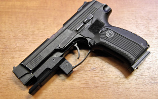 Black gun wooden table vector 3 - a black handle free wallpaper