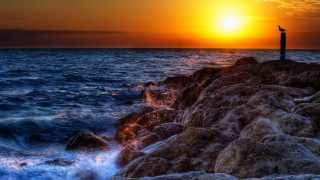 Sunset ocean rock island sky - a rock near the ocean free wallpaper