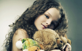 Girl holding stuffed animals smiling - stuffed free wallpaper