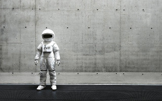 Child space suit wall holes - science fiction free wallpaper