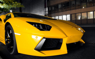 Yellow sports car night road - a yellow sports car free wallpaper