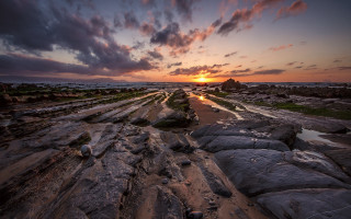 Sunset rocky beach water foreground 8 - a few rock free wallpaper