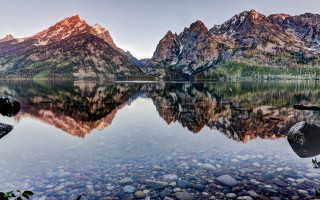 Mountain range reflection lake nature - rock and pebbles free wallpaper